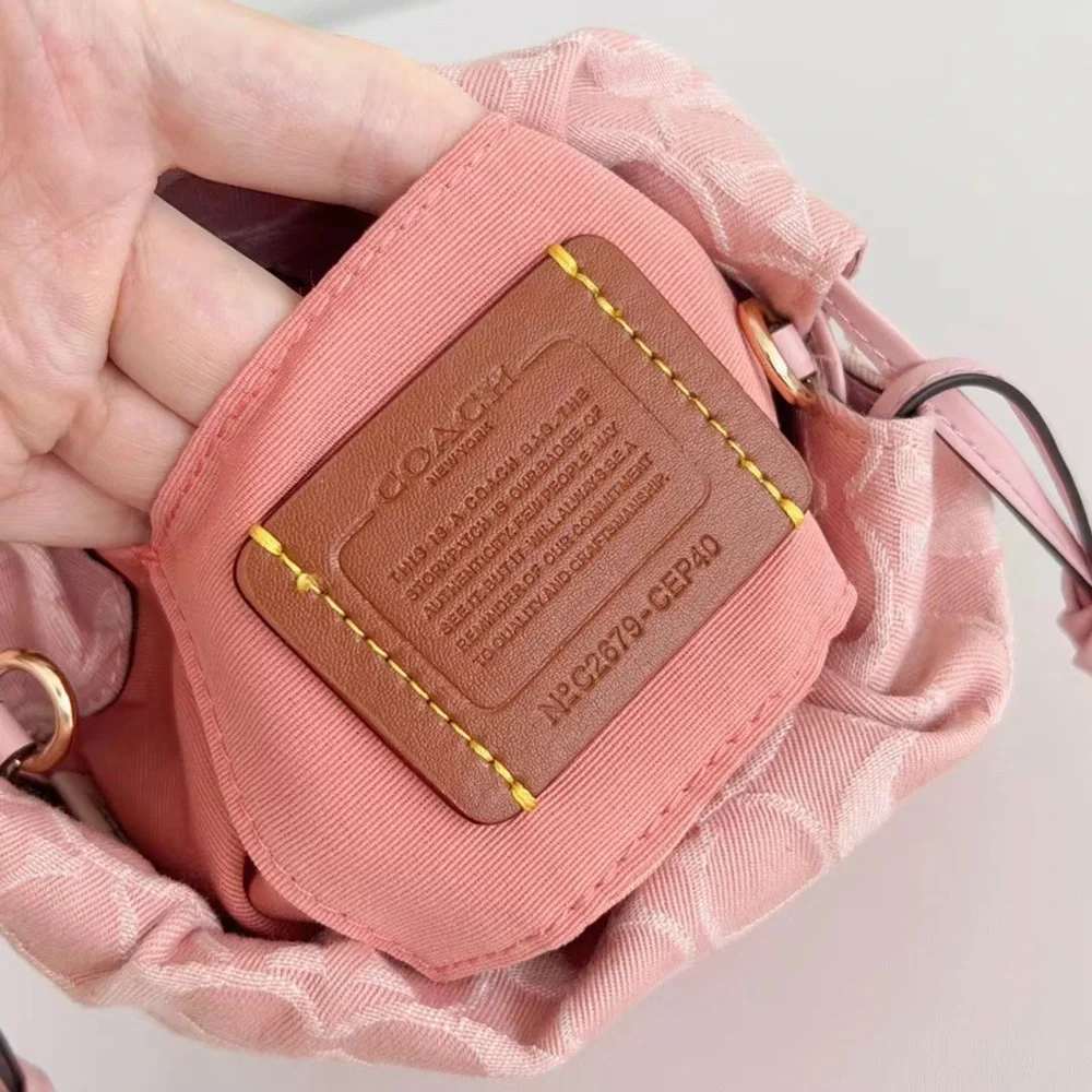 Coach Pink Signature Jacquard Mini Bucket Drawstring Crossbody Bag